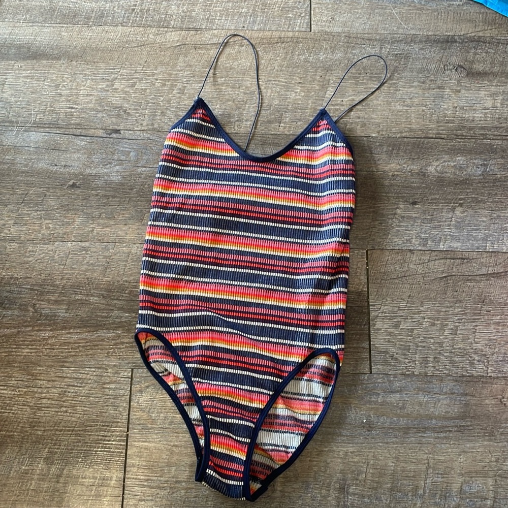 Out from under striped bodysuit